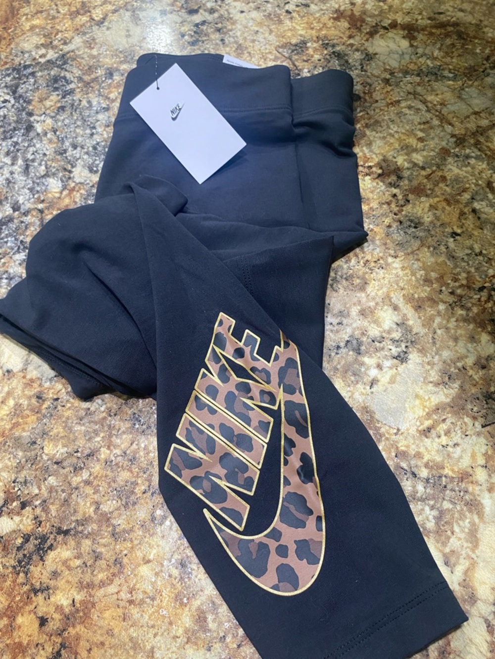 Nike Women’s Black Joggers with Gold Logo